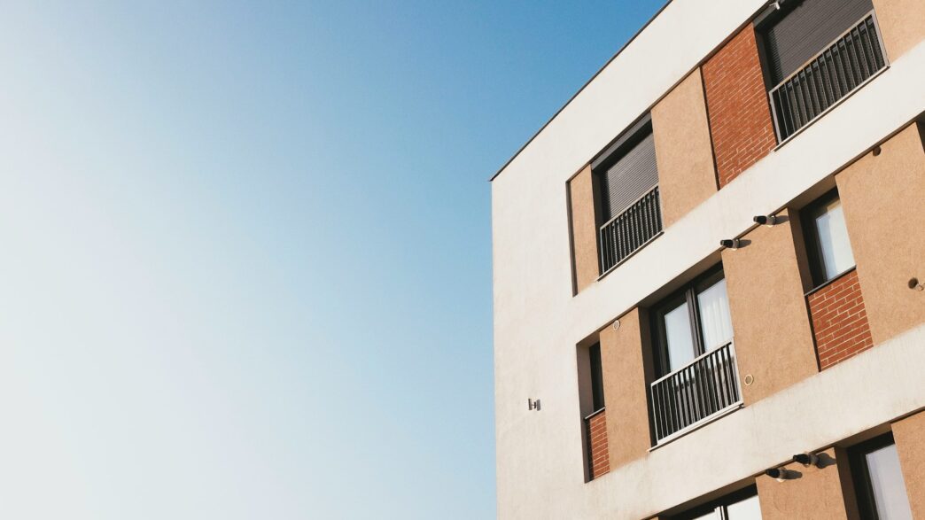 white and brown concrete building under blue sky during daytime